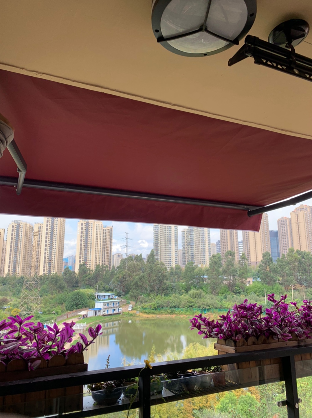 澄迈高级别墅折叠遮雨棚安装_海南布斯遮阳(图1)
